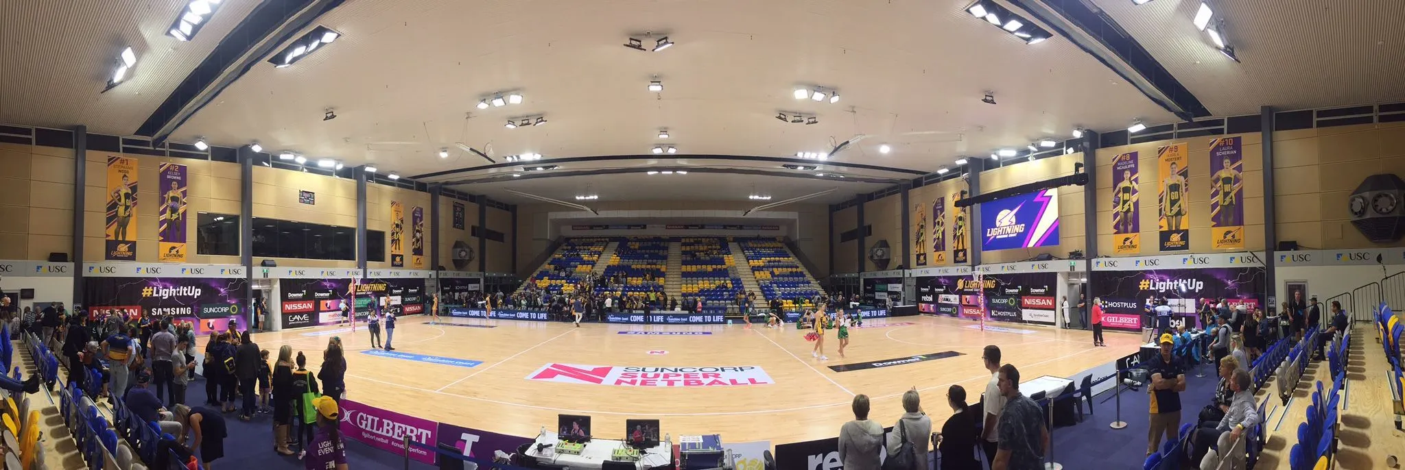 Panorama of the netball stadium during a televised match